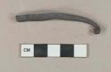 Ferrous, wrought iron fragment, likely decorative element