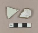 Molded pearlware body sherd; undecorated whiteware body sherd