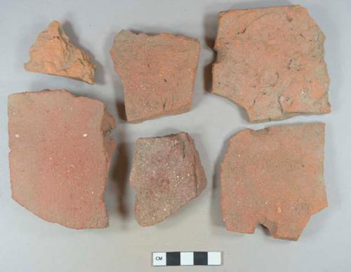 Brick fragments; redware roof tile fragments, two fragments crossmend