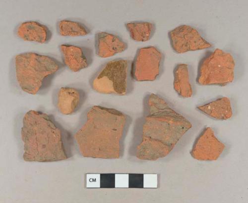 Brick fragments; undecorated lead glazed redware body sherds; slip decorated lead glazed redware body sherd