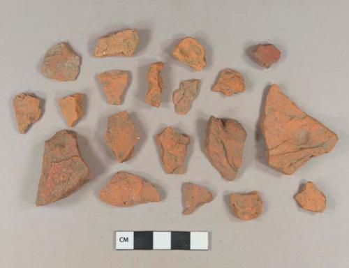 Brick fragments; redware roof tile fragments; stone fragment; undecorated lead glazed redware body sherd