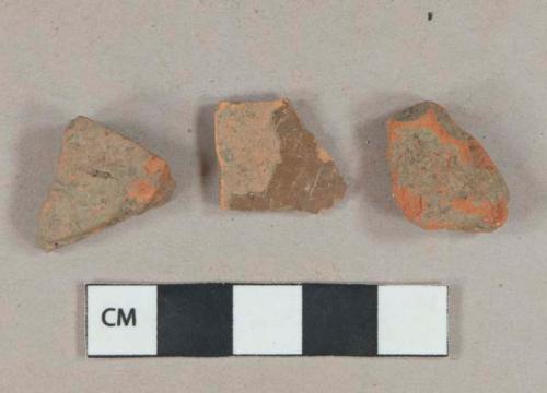 2 red brick fragments, 1 brown lead glazed redware vessel body fragment