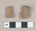 Undecorated redware pipe stem fragments, foot included, both pieces will mend, 8/64" bore diameter