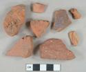 2 red brick fragments; 3 red ceramic roof tile fragments; 3 redware vessel body fragments, 2 with brown lead glaze