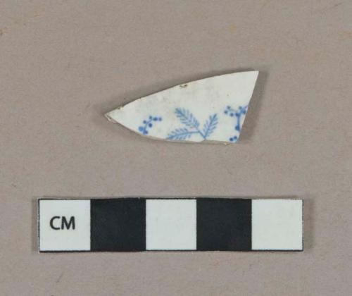 Blue on white transferprinted whiteware vessel body fragment, white paste