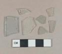 Light aqua flat glass fragments; Colorless flat glass fragments