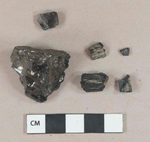 2 coal fragments; 4 charcoal fragments