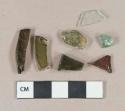 2 aqua green vessel glass body fragment; 1 amber vessel glass body fragment; 4 olive vessel glass body fragments, likely bottle