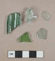 Aqua bottle glass fragments; aqua bottle glass rim fragment, either prescription or patent finish; green bottle glass fragment