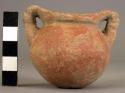 Miniature pottery jar with incised handles  Painted Handled ware