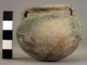 Pottery jar, with handles, incised ornament