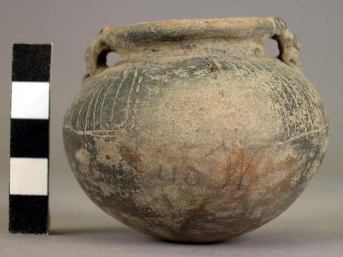 Pottery jar, with handles, incised ornament