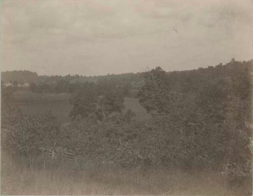 General view looking west, house in distance