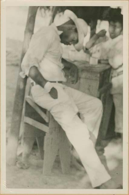 Men at a table after a dance