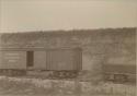 Wabash train car on tracks near mounds