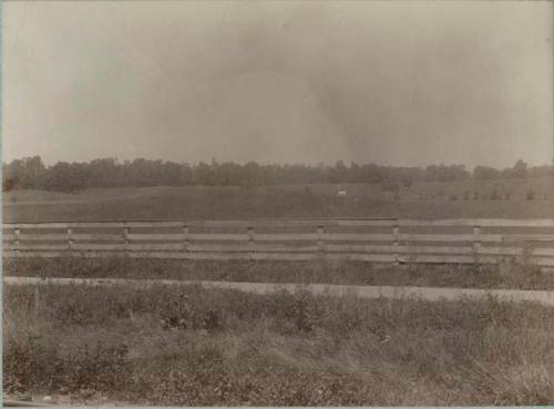 Farm landscape with view of fence