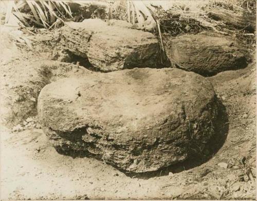 One of the altars and portions of two of the stelae in front of Structure B