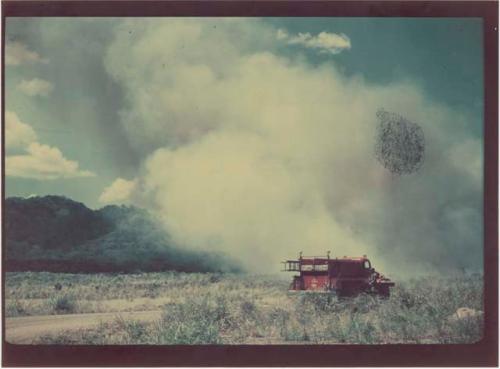 Army burning grass, looking west