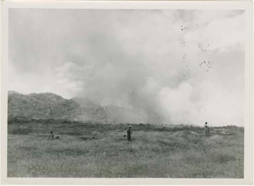 Army burning grass northwest of Area B