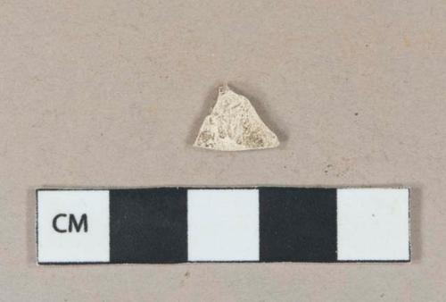 Unidentified refined earthenware body sherd, missing all glaze