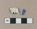 Blue hand painted molded pearlware body sherd; blue hand painted refined earthenware body sherd