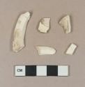 Undecorated creamware body sherds; undecorated creamware base sherds, two sherds crossmend