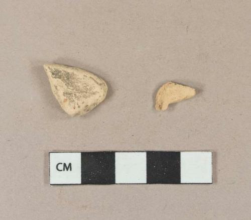 Tin glaze earthenware body sherds, missing all glaze