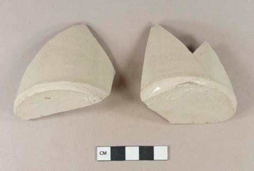 Buff bodied, buff glazed stoneware bottle base sherds; two sherds crossmend