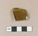 Yellow-green bottle glass fragment