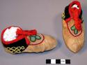 Pair of child's moccasins with beaded decoration - 3 pieces, straight toe seam &