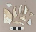 Undecorated creamware body sherd; undecorated pearlware body sherds; undecorated pearlware base sherds, three sherds crossmend; undecorated whiteware body sherd; undecorated ironstone rim sherds, two sherds crossmend