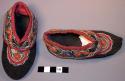 Pair of children's moccasins--embroidered on toe and around ankle