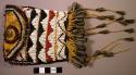 Yellow buckskin pouch with multi-colored beadwork.