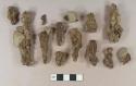 Unidentified iron nail fragments, many with stones adhered, one with colorless bottle glass fragment adhered, one with coal fragment adhered; unidentified iron fragments, many with stones adhered; stone fragment