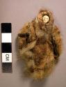 Small doll, carved ivory head, fur body and hood.
