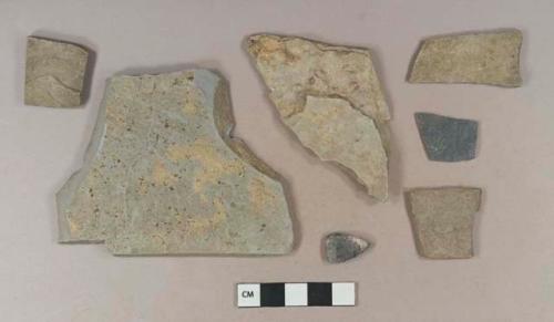 Bluish-gray mudstone fragments, possibly architectural; 1 dark gray slate fragment; 1 coal ash/clinker fragment