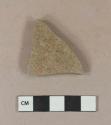 Undecorated tan salt-glazed stoneware vessel body fragment, grayish-brown paste