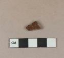 Dark brown lead glazed redware vessel body fragment