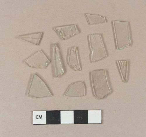 Colorless flat glass fragments; 1 colorless glass vessel body fragment