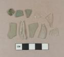 Aqua flat glass fragments; 3 aqua glass vessel body fragments; 2 colorless vessel glass body fragments