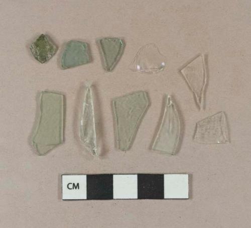 Aqua flat glass fragments; 3 aqua glass vessel body fragments; 2 colorless vessel glass body fragments