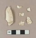 Undecorated creamware body sherds; undecorated creamware base sherd; molded creamware body sherd