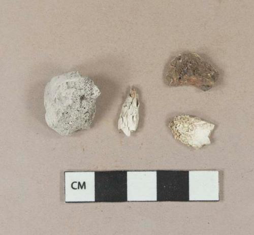 Unidentified calcined bone fragments; 1 clinker fragment