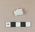 White porcelain vessel base fragment, white paste, part of blue decoration