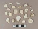 Undecorated creamware vessel body fragments, white or light buff paste; 7 White undecorated pearlware vessel body fragments; 2 clinker or coal ash fragments