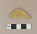 Yellow lead glazed earthenware vessel body fragment, buff paste