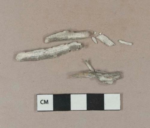 Turned lead fragments, opened but unstamped