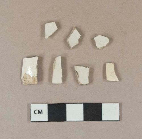 Undecorated white salt glazed stoneware vessel body fragments, white paste; 1 fragment undecorated whiteware vessel body fragment, white paste