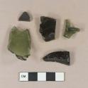 Dark olive green vessel glass body fragments, 1 bottle finish fragment, string rim