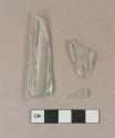Light aqua flat glass fragments, likely square or rectangular bottle fragments